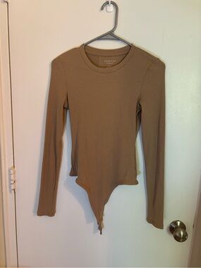 American Eagle Outfitters Ribbed Long-Sleeve Bodysuit in Tan